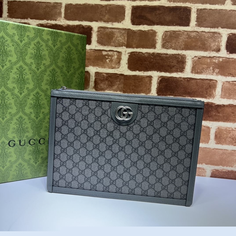G*u*i clutch bags